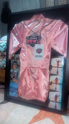 Breezy Bowl Commemorative Frame featuring pink satin robe, model pass, and runway photos